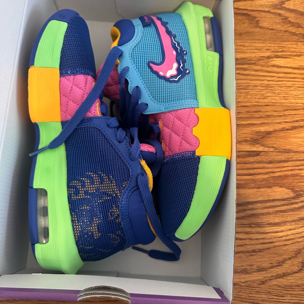 Nike Blue and Pink Athletic Shoes with Modern Silhouette